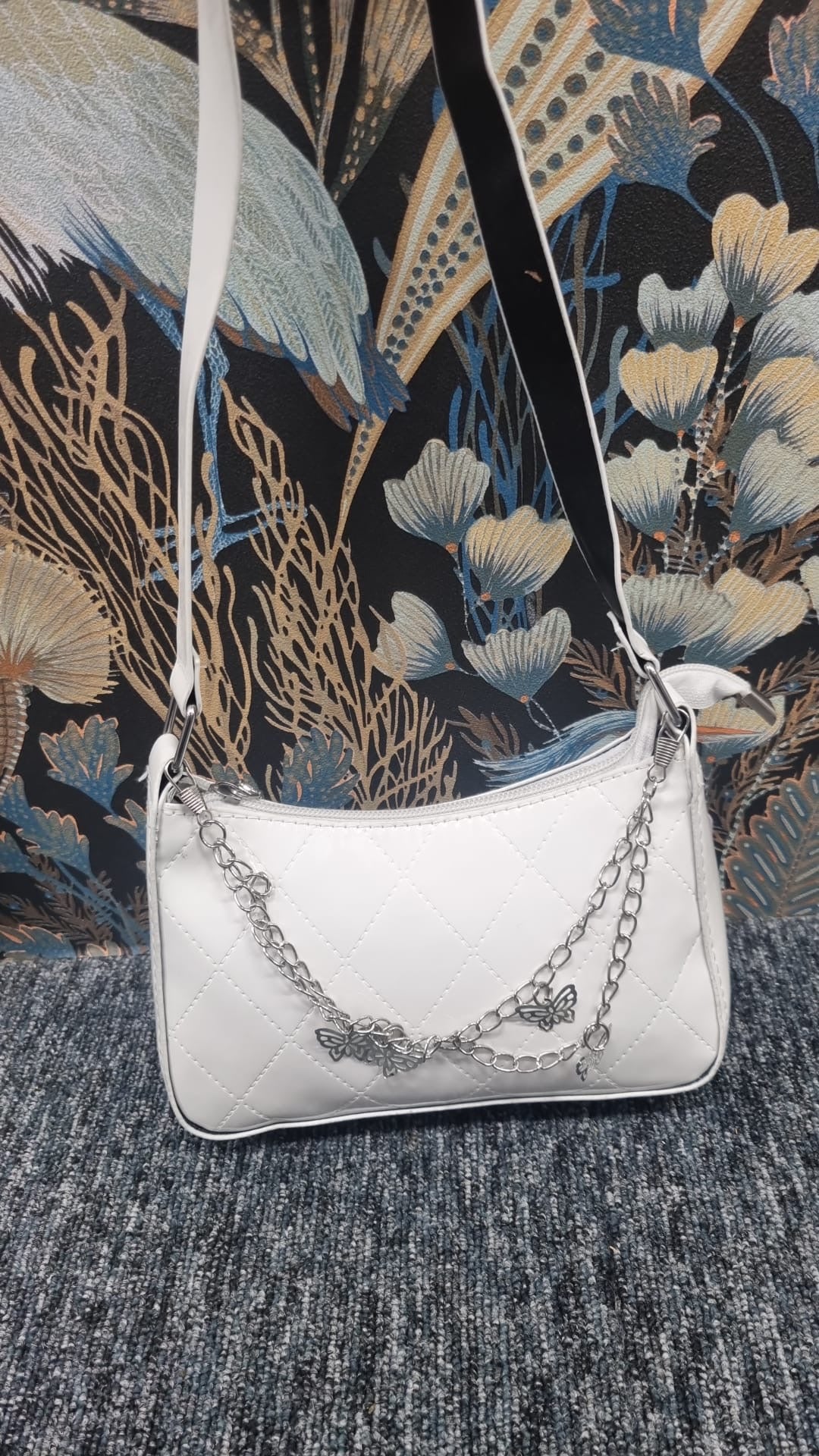 Butterfly chain detail bag