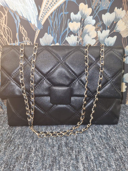 Quilted bag with chain strap