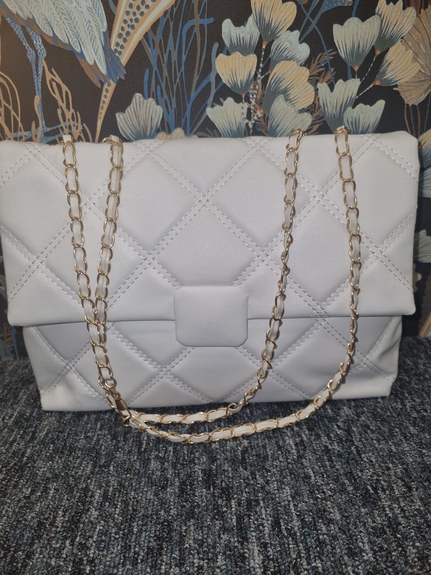 Quilted bag with chain strap