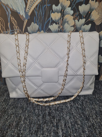 Quilted bag with chain strap