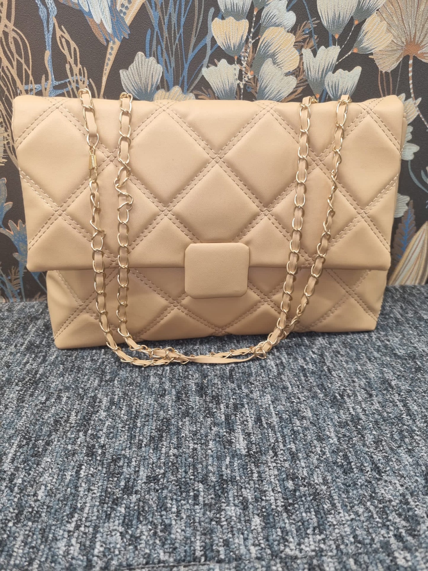 Quilted bag with chain strap